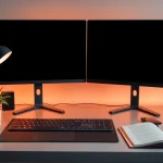 Enhance your productivity with a modern workspace like https://www.informaticsview.com; featuring dual monitors and a cozy atmosphere.