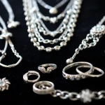 Explore unique silver jewelry pieces showcasing intricate designs and metallic brilliance.