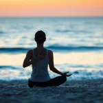 A person practicing yoga at sunset, representing effective strategies for dealing with anxiety.